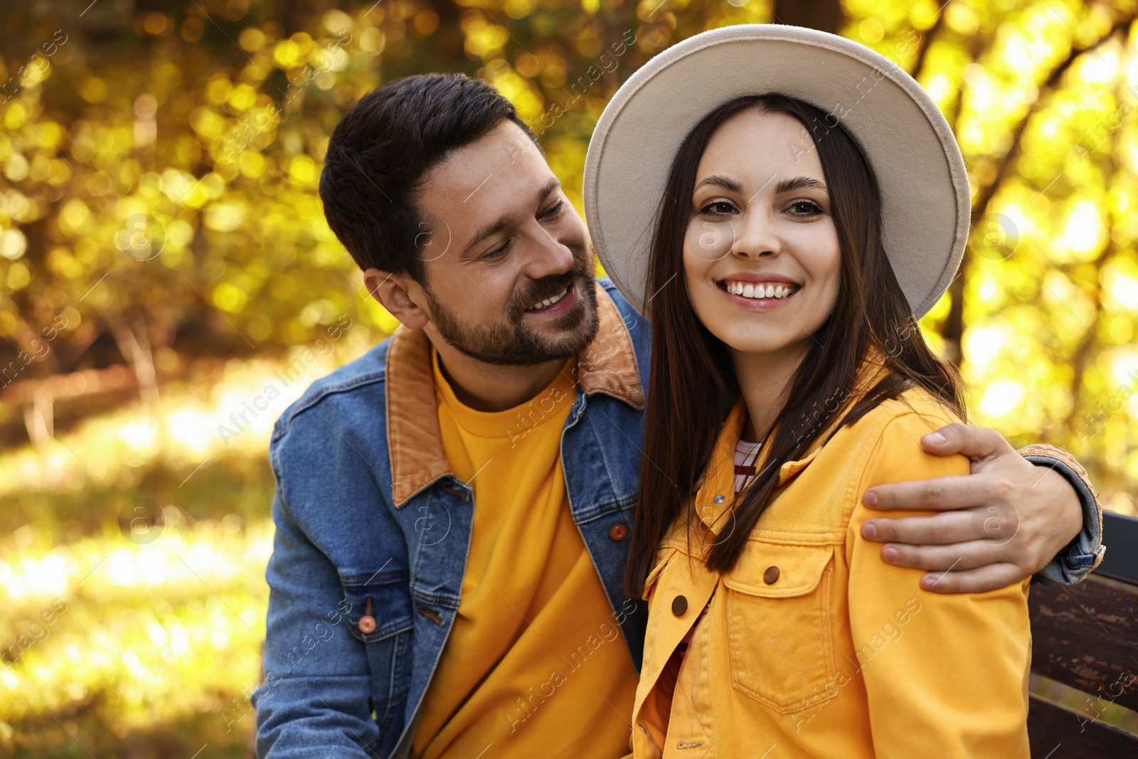 Photo of Beautiful couple spending time together in park on autumn day