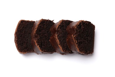 Photo of Slices of tasty chocolate sponge cake isolated on white, top view