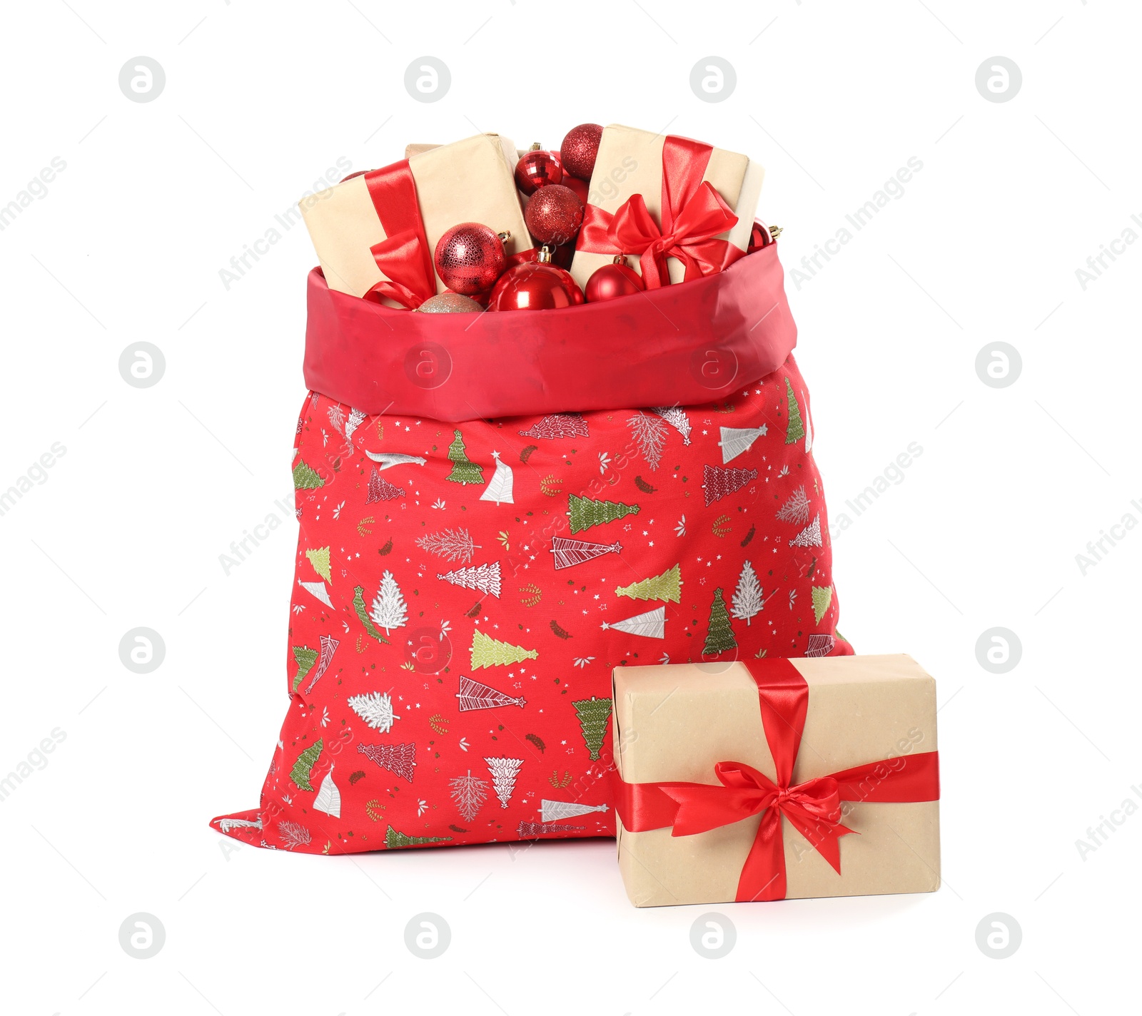 Photo of Santa Claus bag with gift boxes and Christmas balls isolated on white