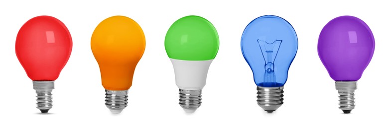 Image of Different light bulbs with colorful glass on white background, set