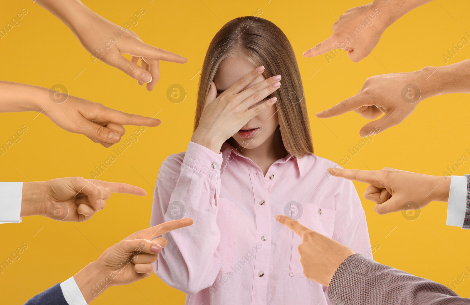 Image of People pointing at embarrassed woman on orange background