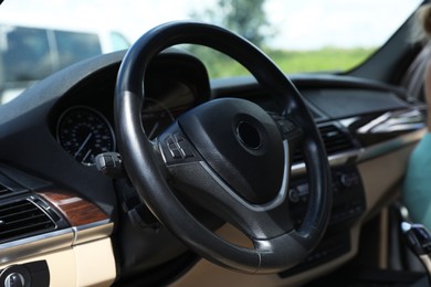 Steering wheel in modern car, view from inside