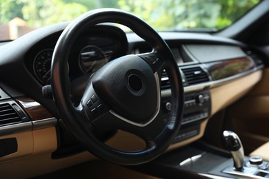 Steering wheel in modern car, view from inside