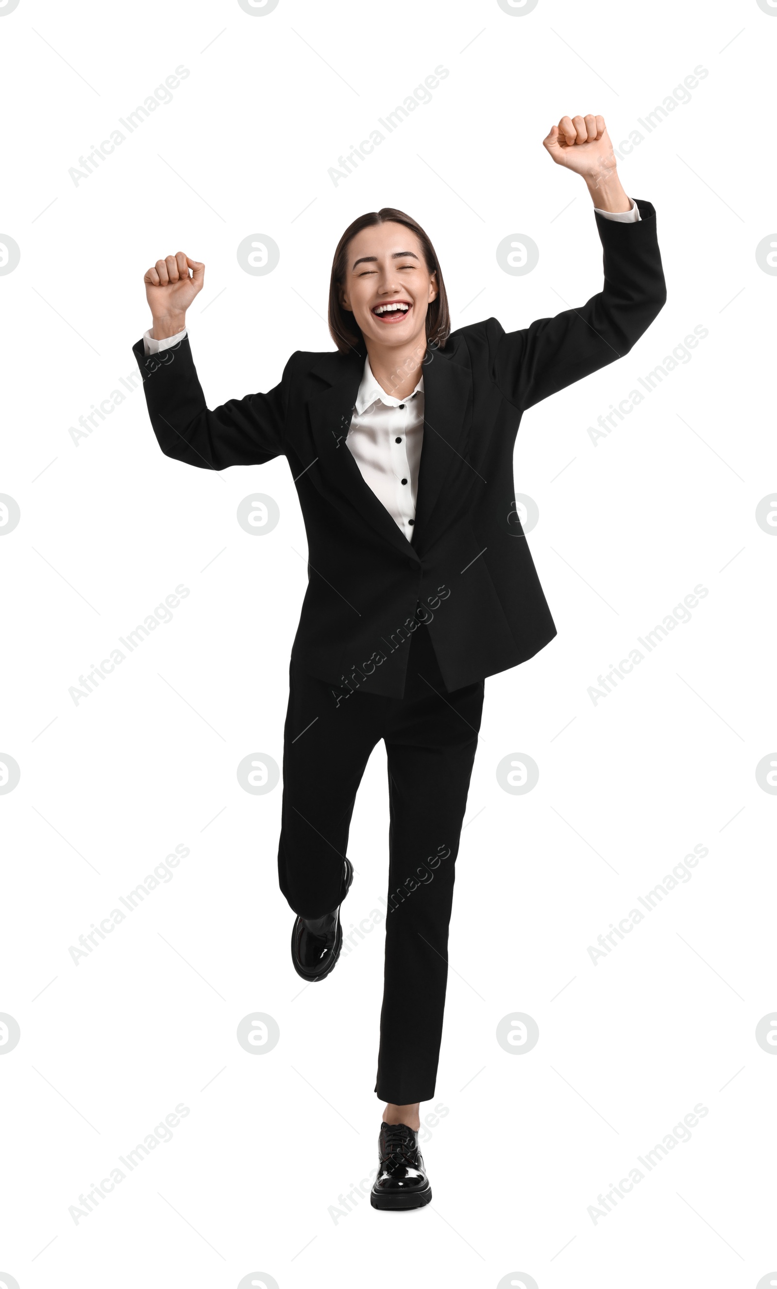 Photo of Young businesswoman in suit running on white background