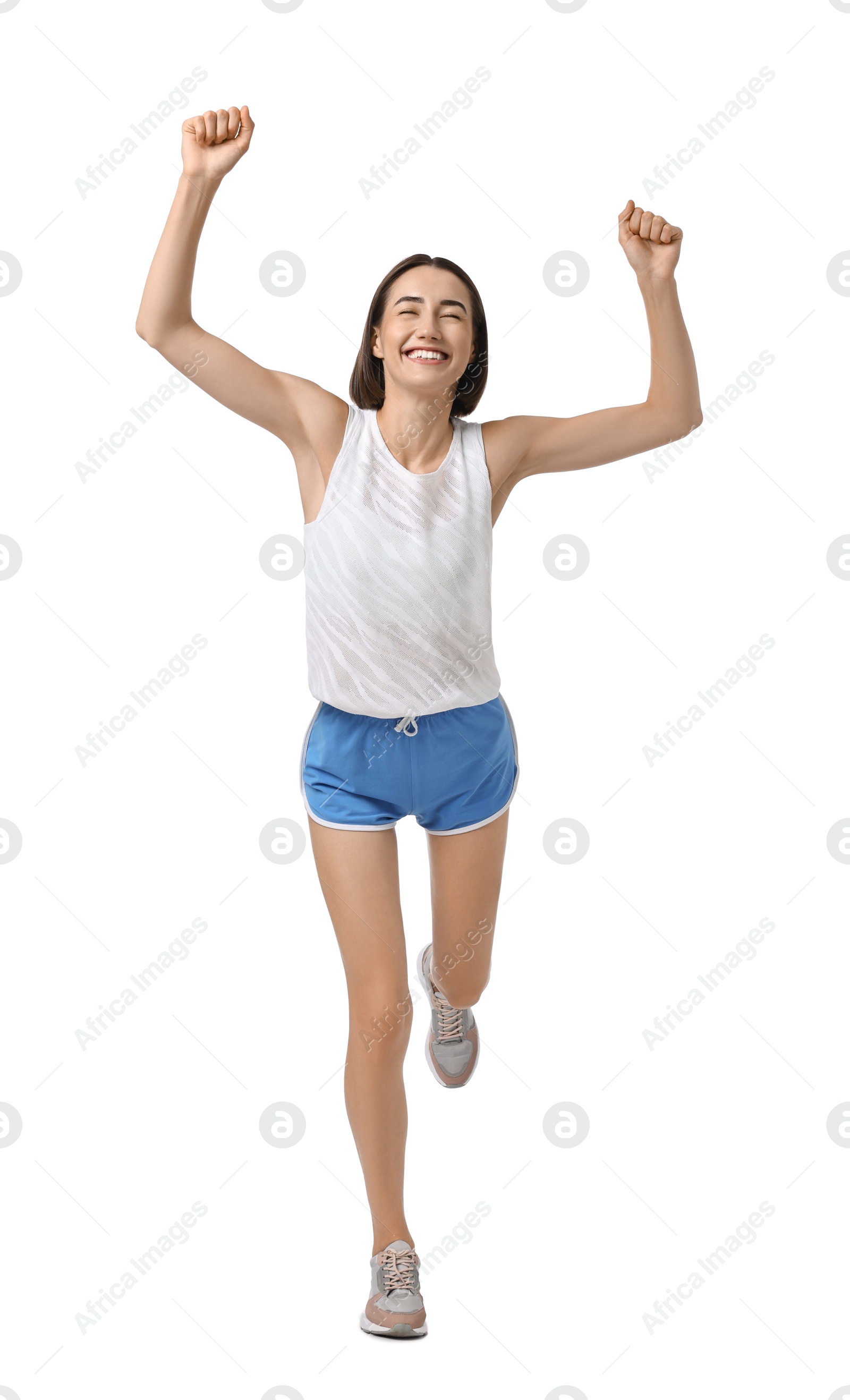 Photo of Beautiful woman in sportswear running on white background