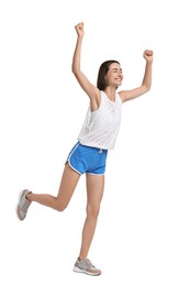 Beautiful woman in sportswear running on white background