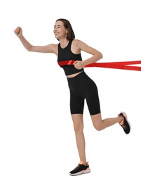 Photo of Beautiful woman in sportswear crossing red finish line on white background