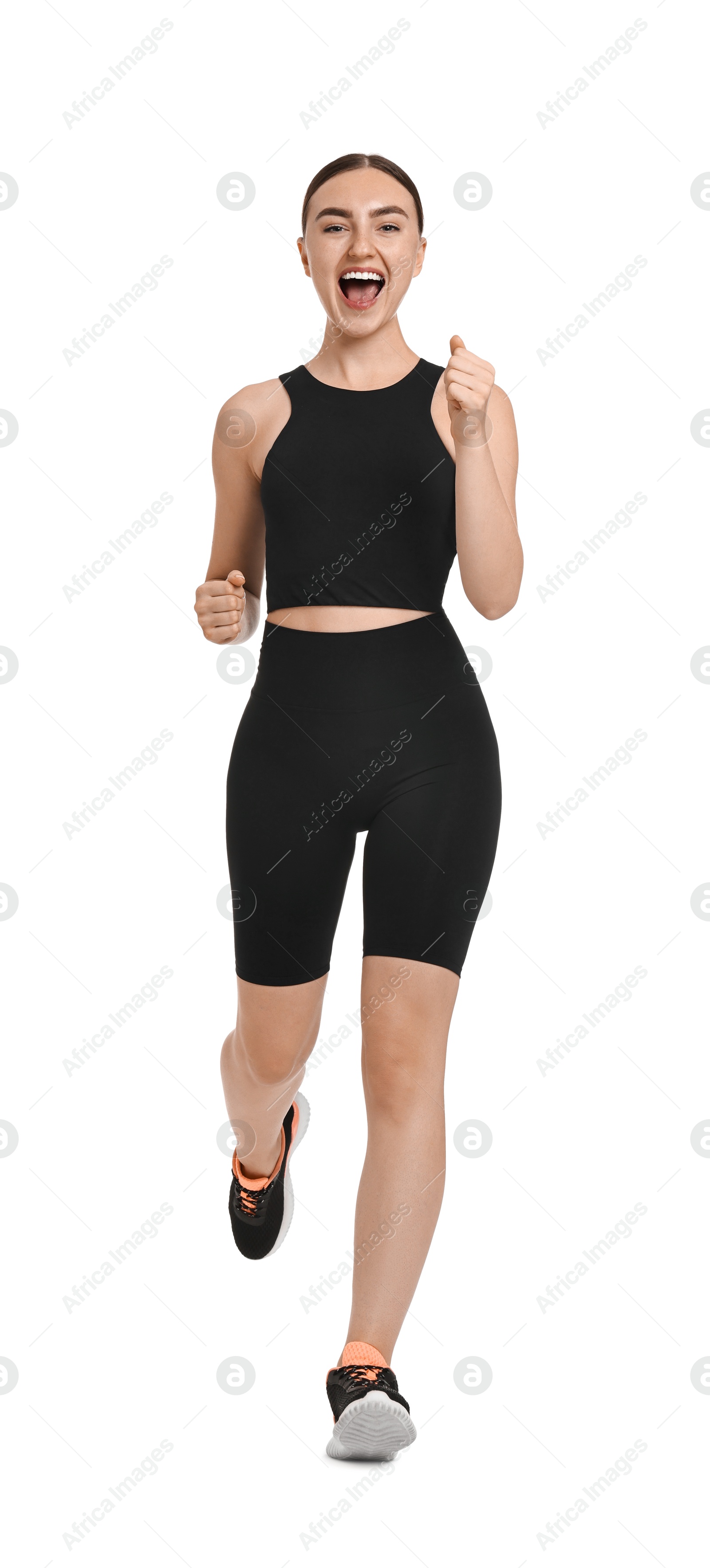 Photo of Beautiful woman in sportswear running on white background