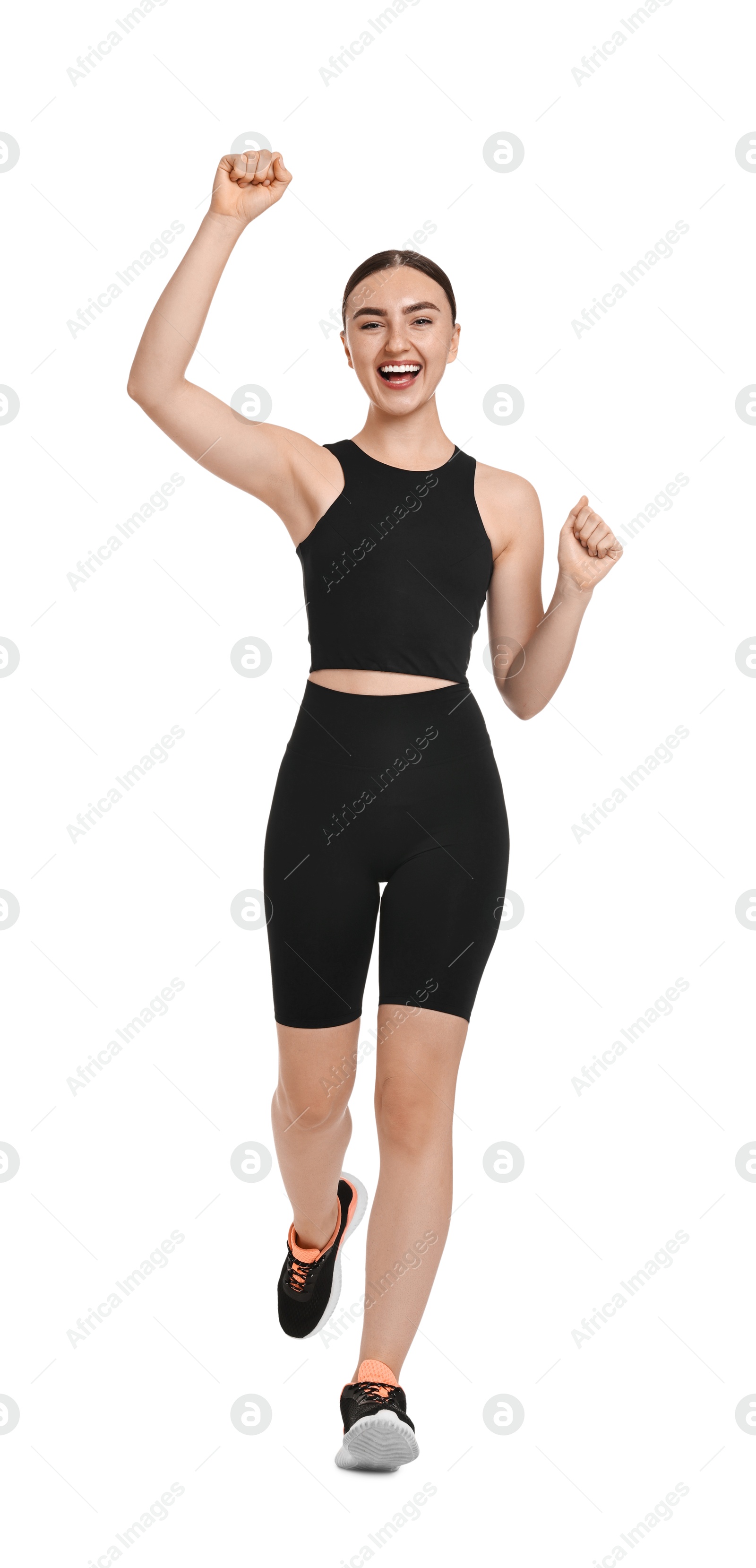 Photo of Beautiful woman in sportswear running on white background