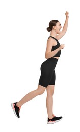 Photo of Beautiful woman in sportswear running on white background