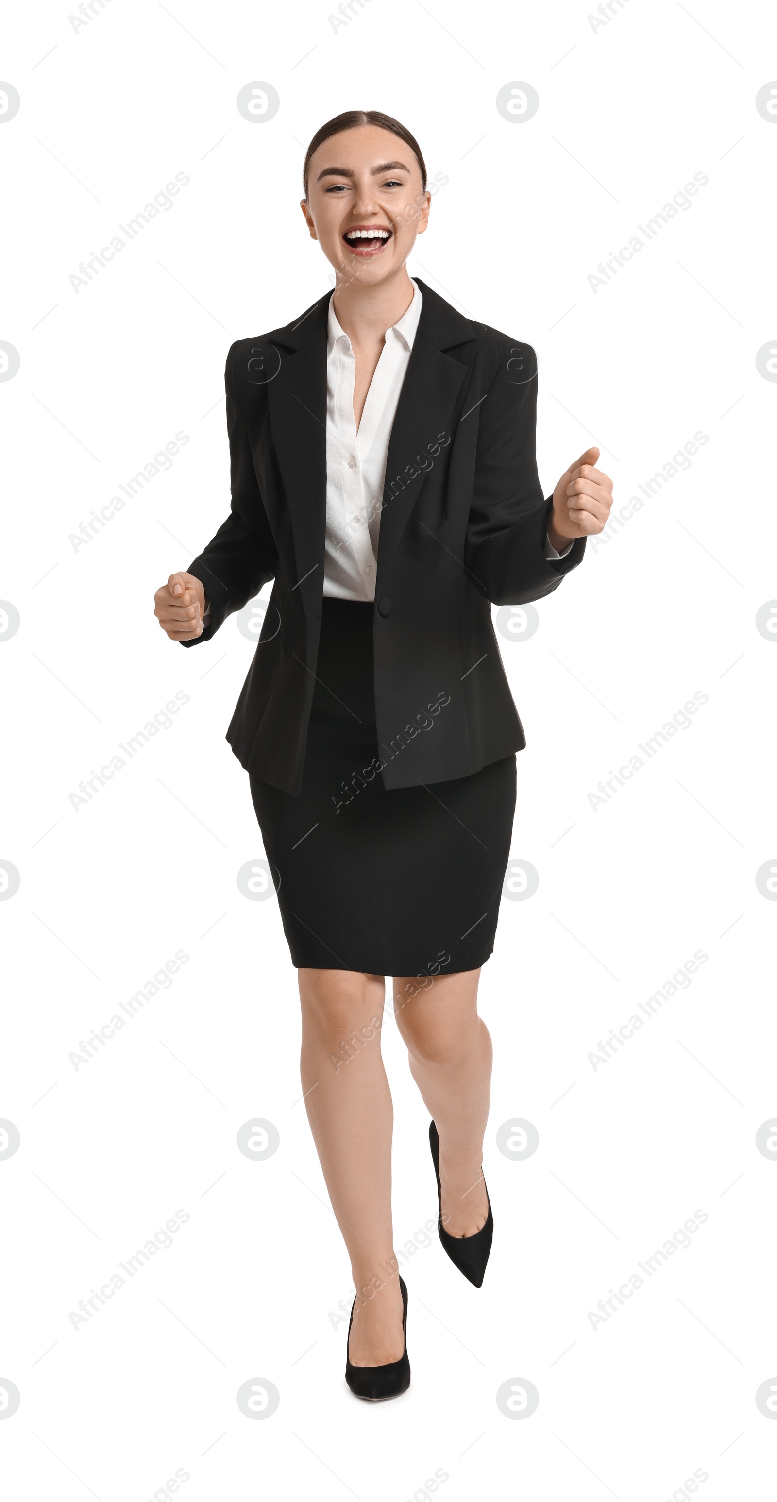 Photo of Young businesswoman in suit running on white background