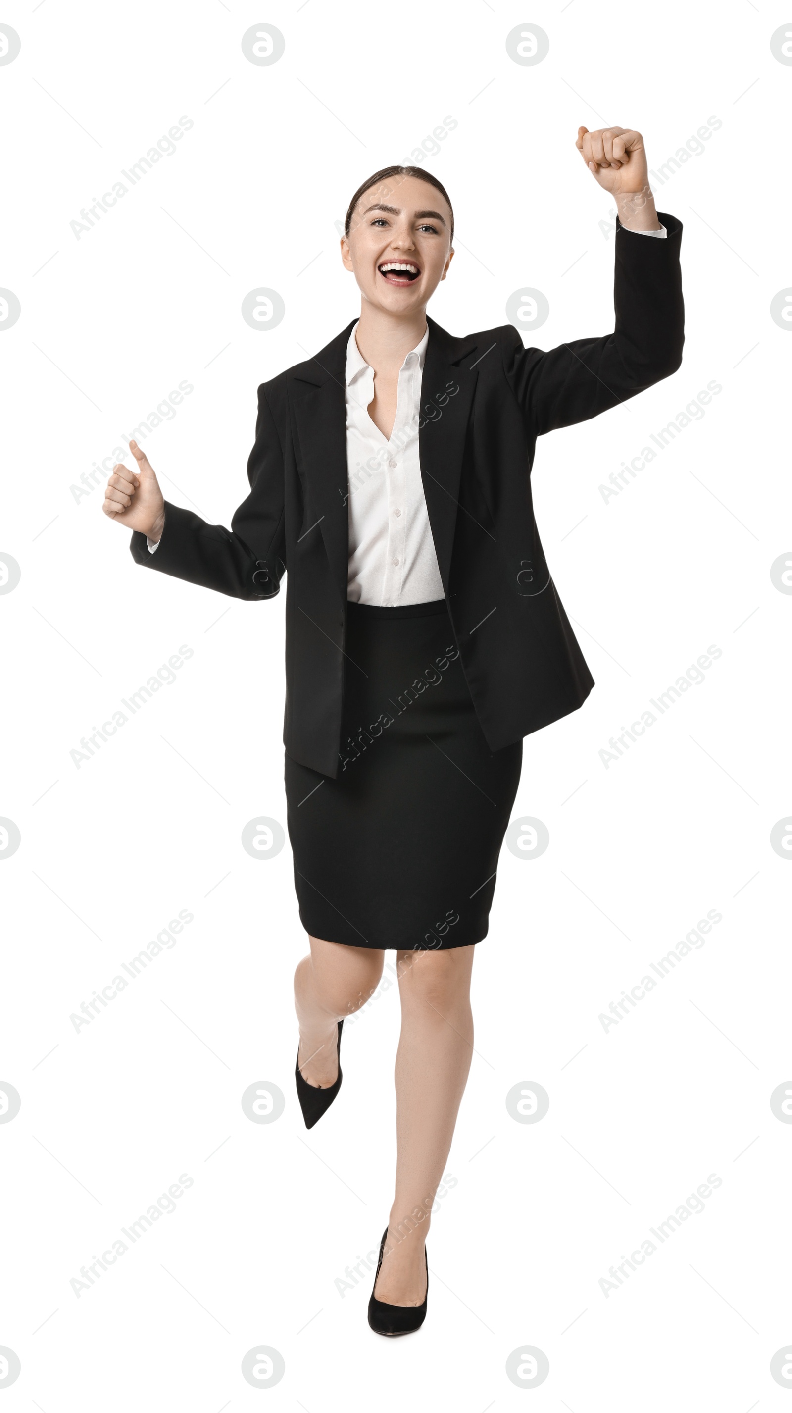 Photo of Young businesswoman in suit running on white background