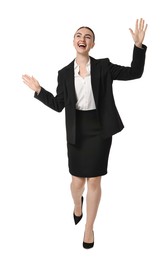 Young businesswoman in suit running on white background