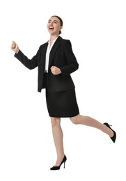 Photo of Young businesswoman in suit running on white background