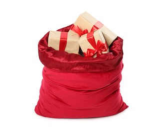 Photo of Santa Claus bag with gift boxes isolated on white