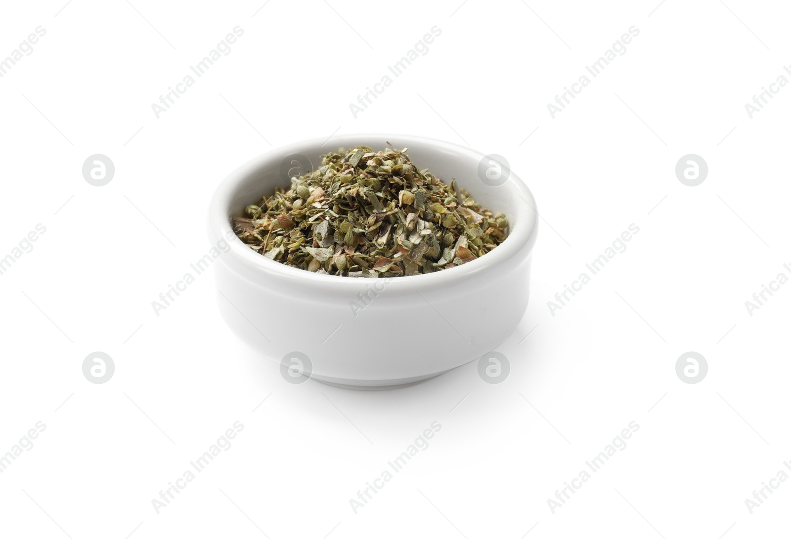 Photo of Dried oregano in bowl isolated on white