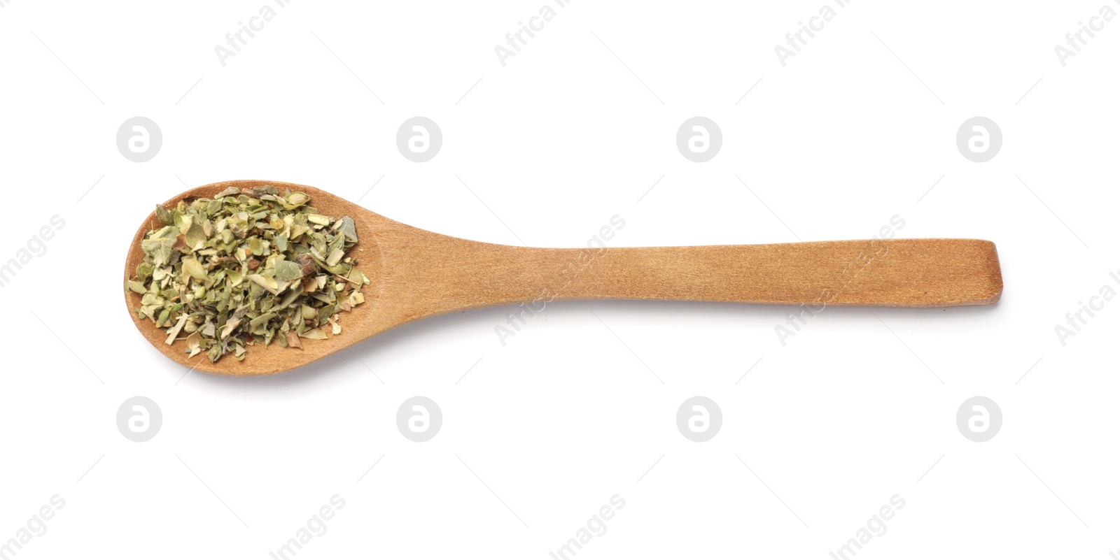 Photo of Dried oregano in spoon isolated on white, top view