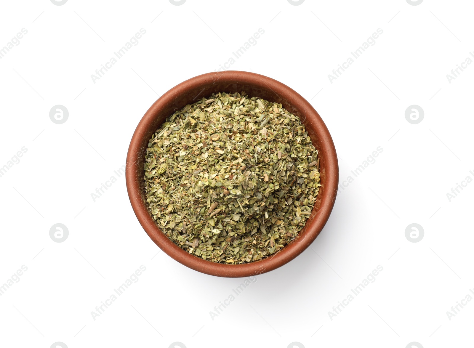 Photo of Dried oregano in bowl isolated on white, top view