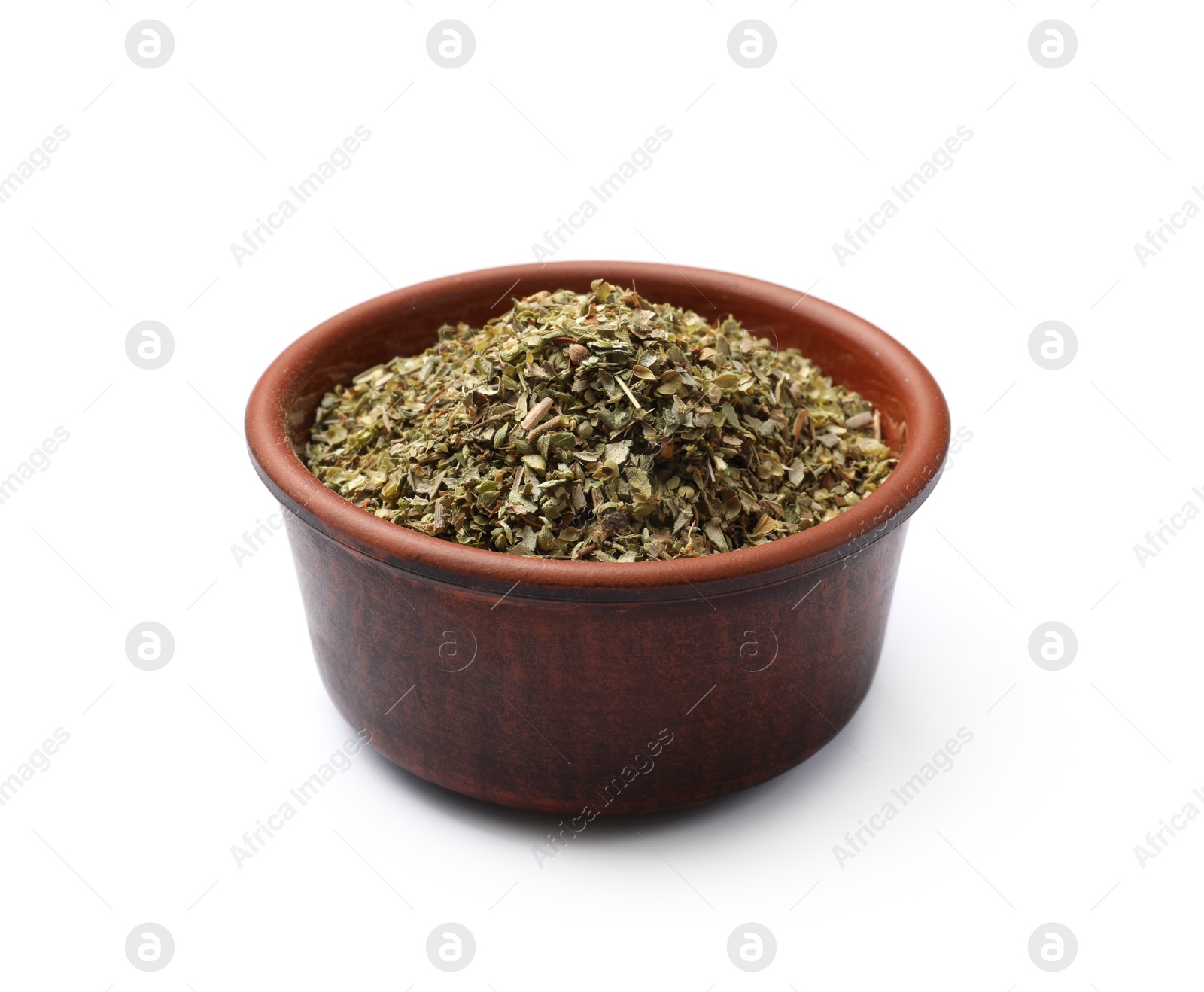 Photo of Dried oregano in bowl isolated on white