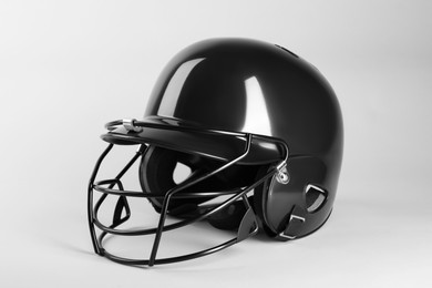 One black baseball helmet on white background