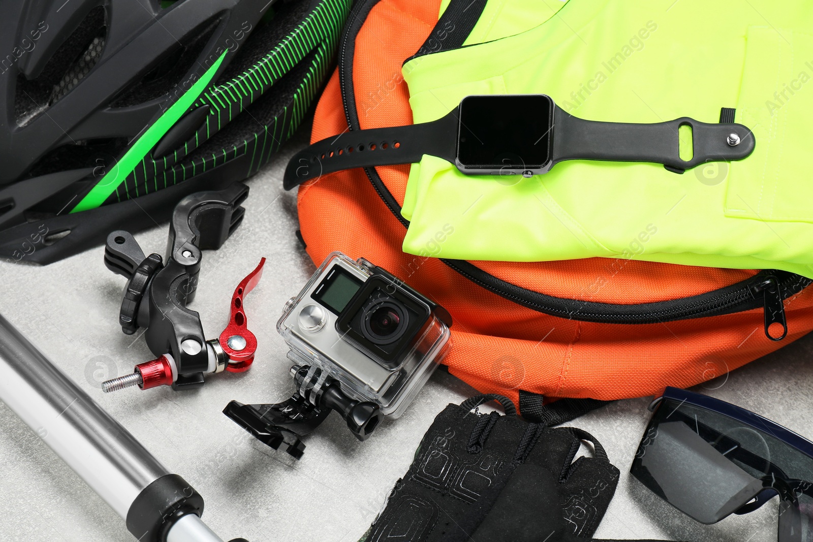 Photo of Bicycle accessories and equipment on grey textured table