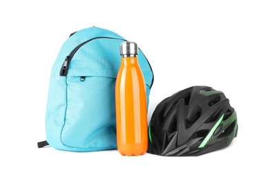 Bicycle helmet, thermo bottle and backpack isolated on white