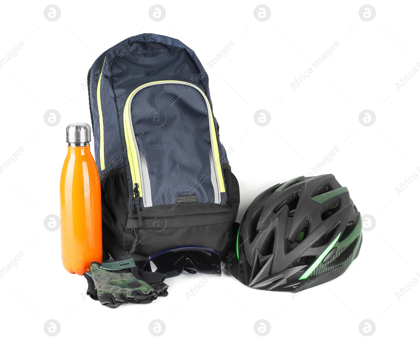 Photo of Bicycle helmet, fingerless gloves, thermo bottle and backpack isolated on white