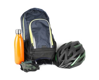 Bicycle helmet, fingerless gloves, thermo bottle and backpack isolated on white