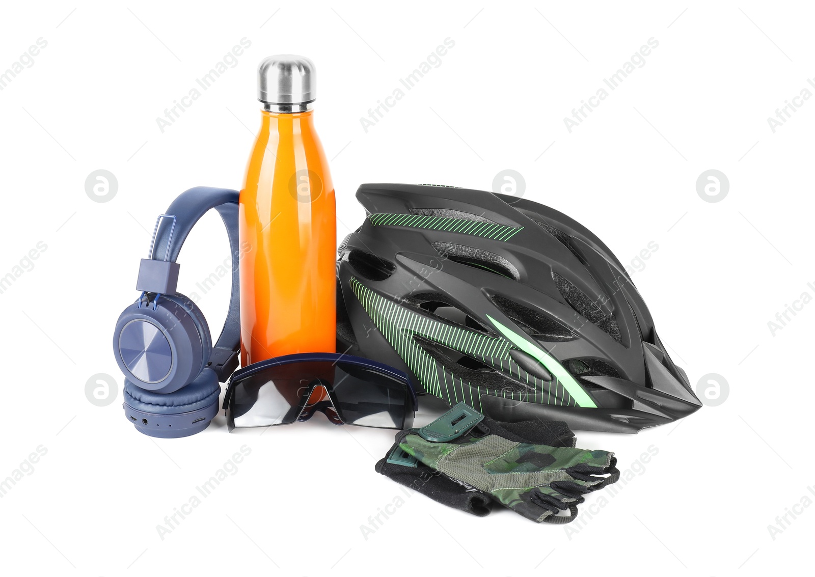 Photo of Bicycle helmet, accessories, thermo bottle and headphones isolated on white