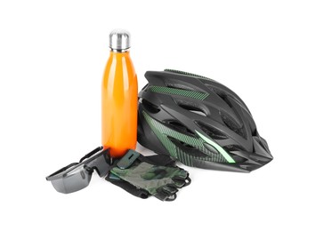 Photo of Bicycle helmet, fingerless gloves, thermo bottle and goggles isolated on white