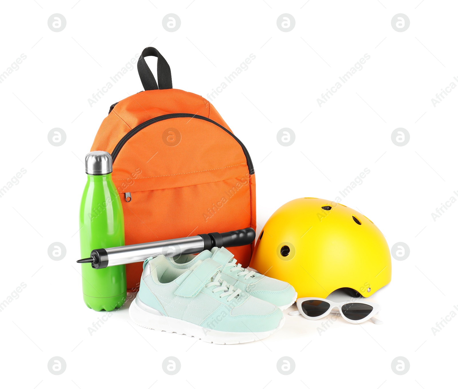 Photo of Bicycle helmet, thermo bottle, sneakers, sunglasses, pump and backpack isolated on white