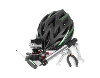 Photo of Bicycle helmet, action camera and different tools isolated on white