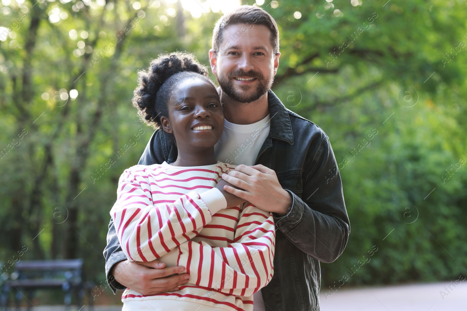 Photo of International relationships. Portrait of lovely couple outdoors