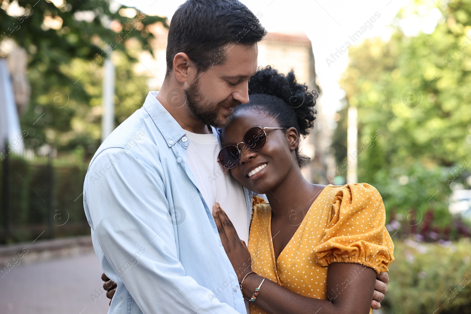 Photo of International relationships. Portrait of lovely couple outdoors