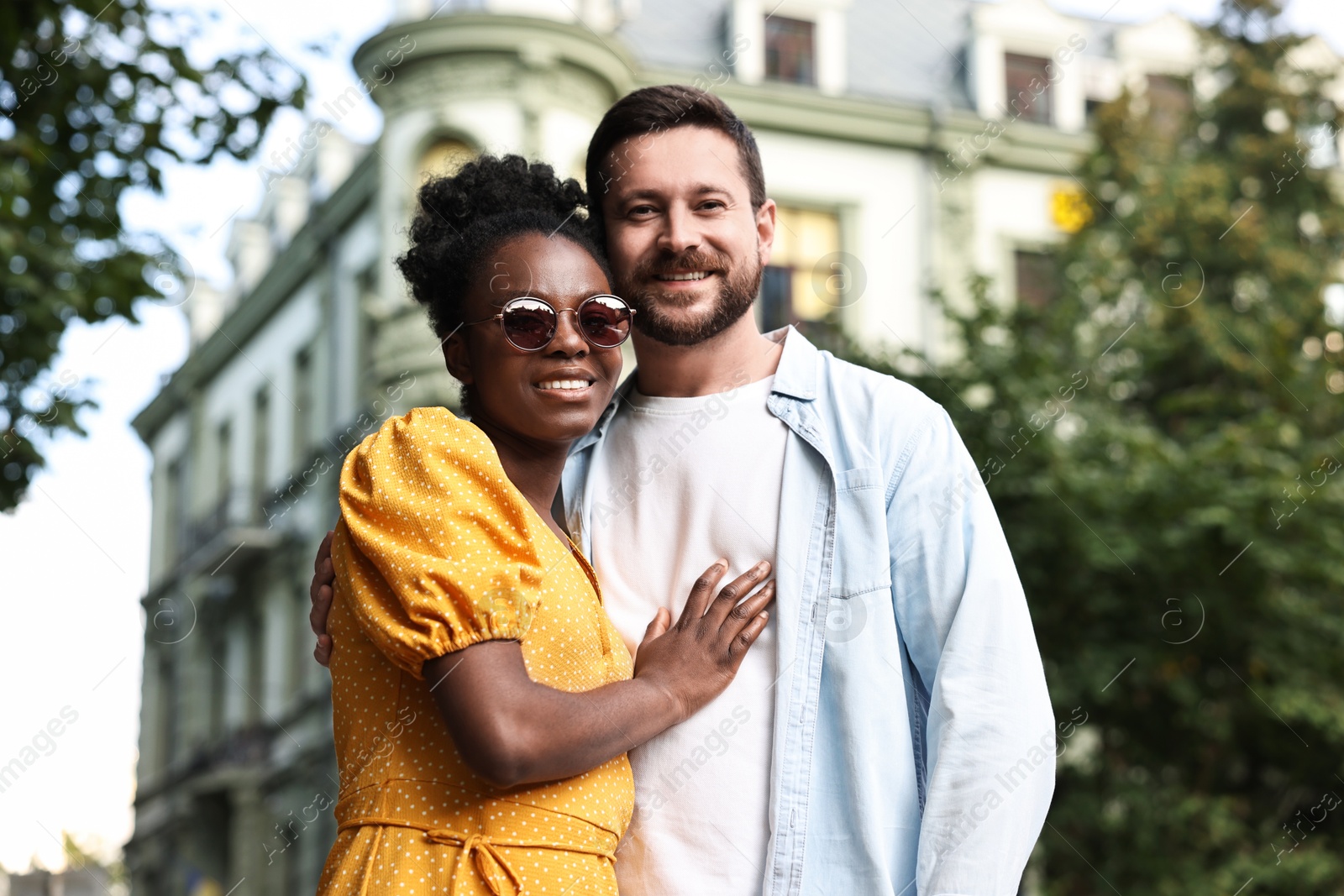 Photo of International relationships. Portrait of lovely couple outdoors