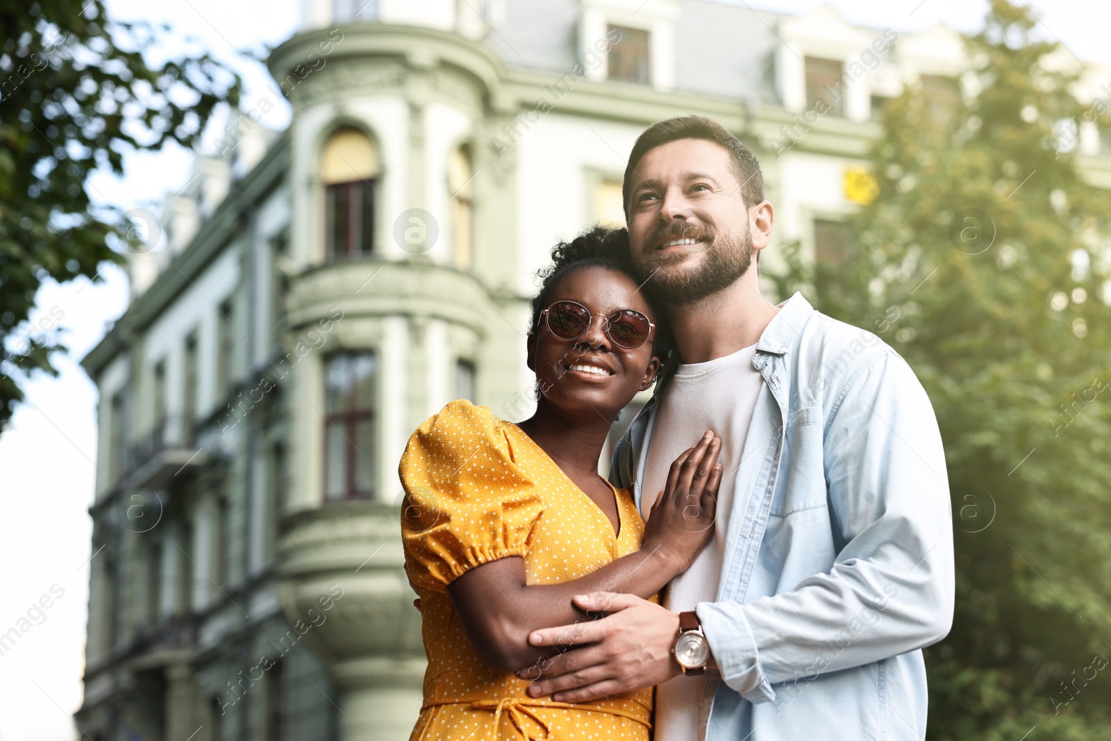 Photo of International relationships. Portrait of lovely couple outdoors, space for text