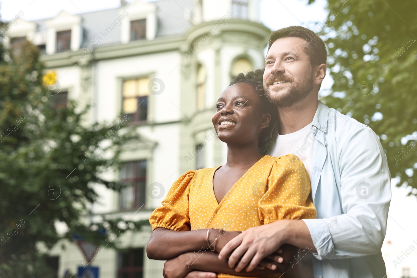 Photo of International relationships. Portrait of lovely couple outdoors, space for text