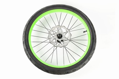 Photo of Bicycle wheel with tire on white background