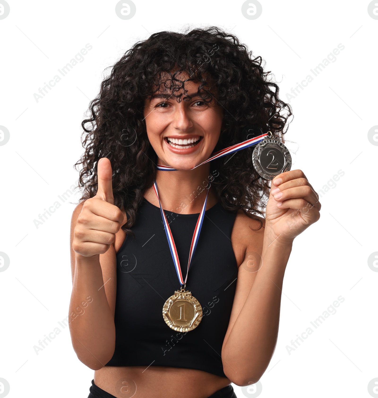 Photo of Happy winner with different medals showing thumbs up on white background