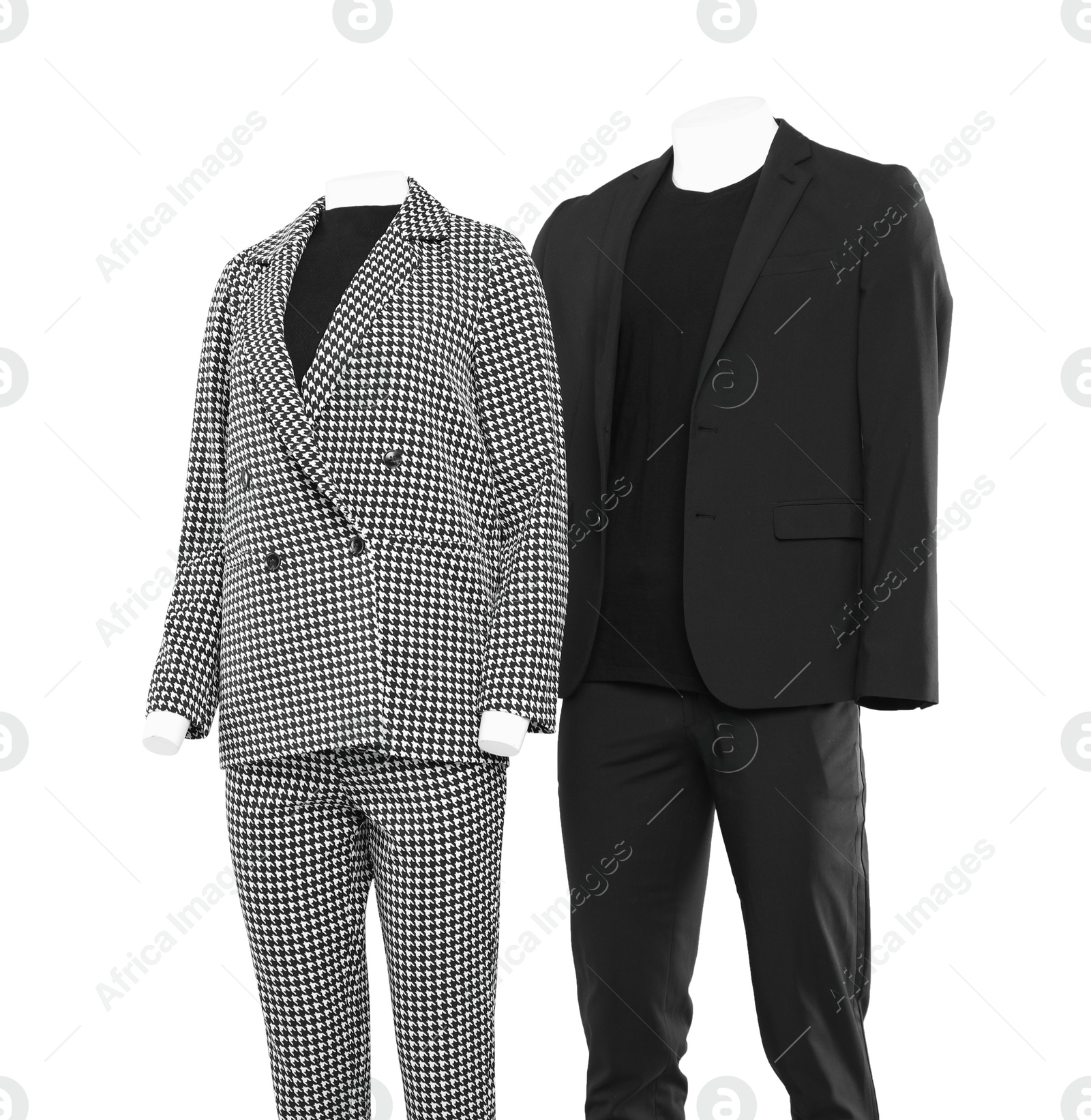 Photo of Female and male mannequins with stylish outfits isolated on white