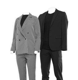 Photo of Female and male mannequins with stylish outfits isolated on white