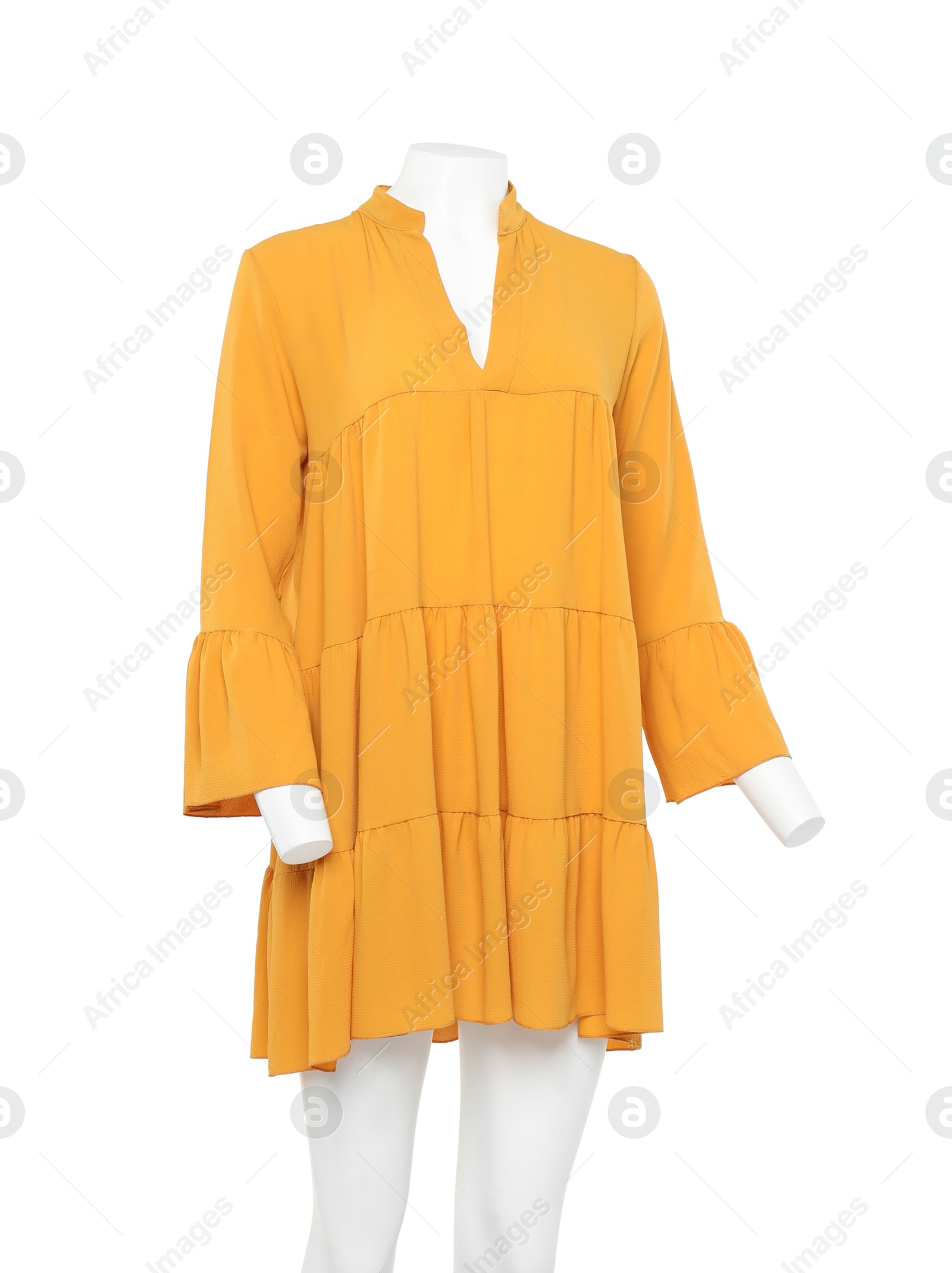 Photo of Female mannequin with stylish orange dress isolated on white