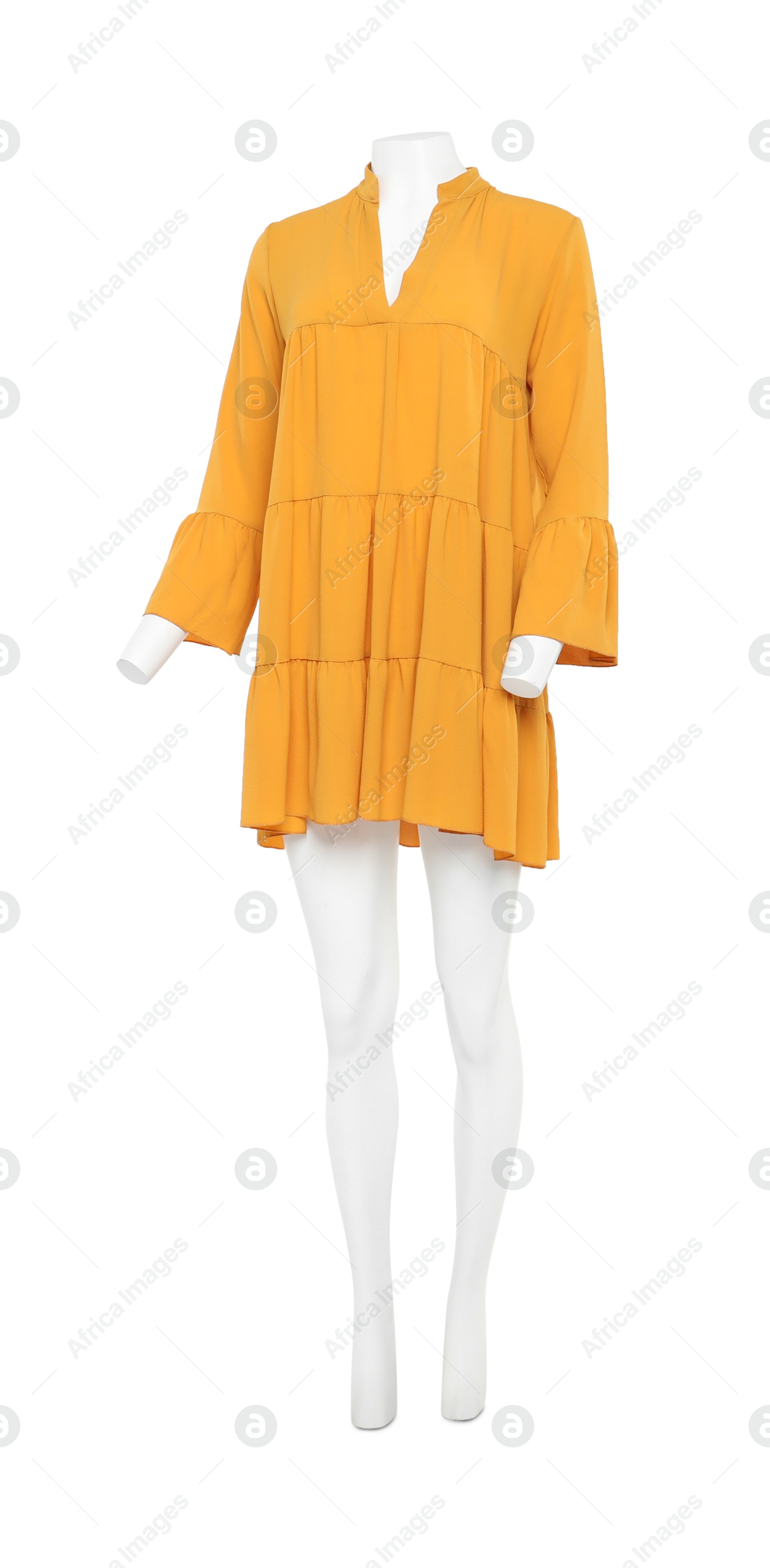 Photo of Female mannequin with stylish orange dress isolated on white