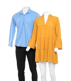 Photo of Female and male mannequins with stylish outfits isolated on white