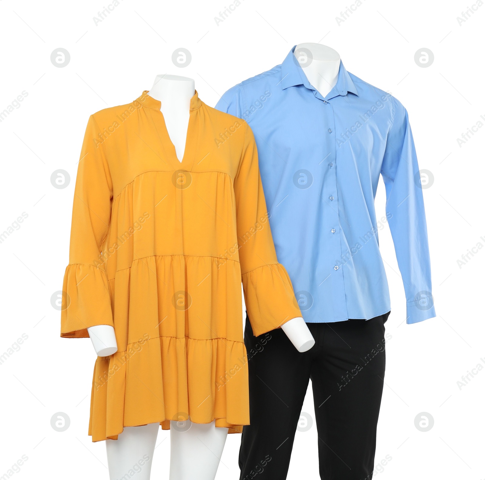 Photo of Female and male mannequins with stylish outfits isolated on white