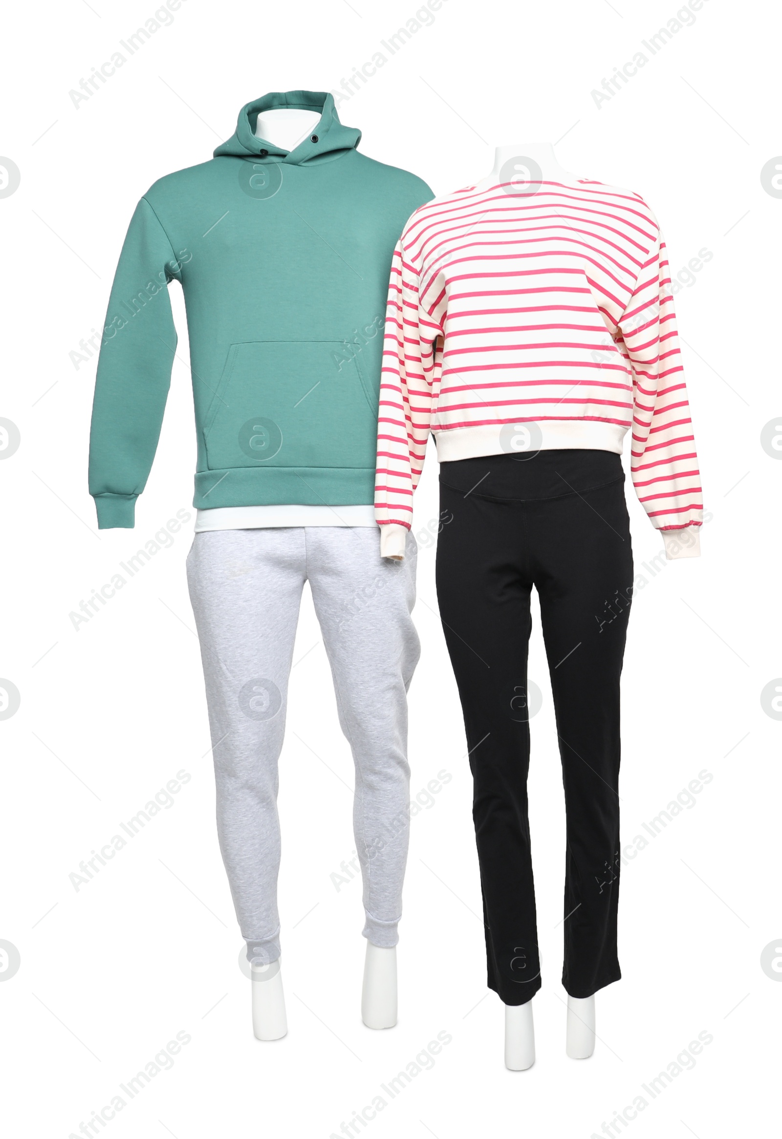 Photo of Female and male mannequins with stylish outfits isolated on white