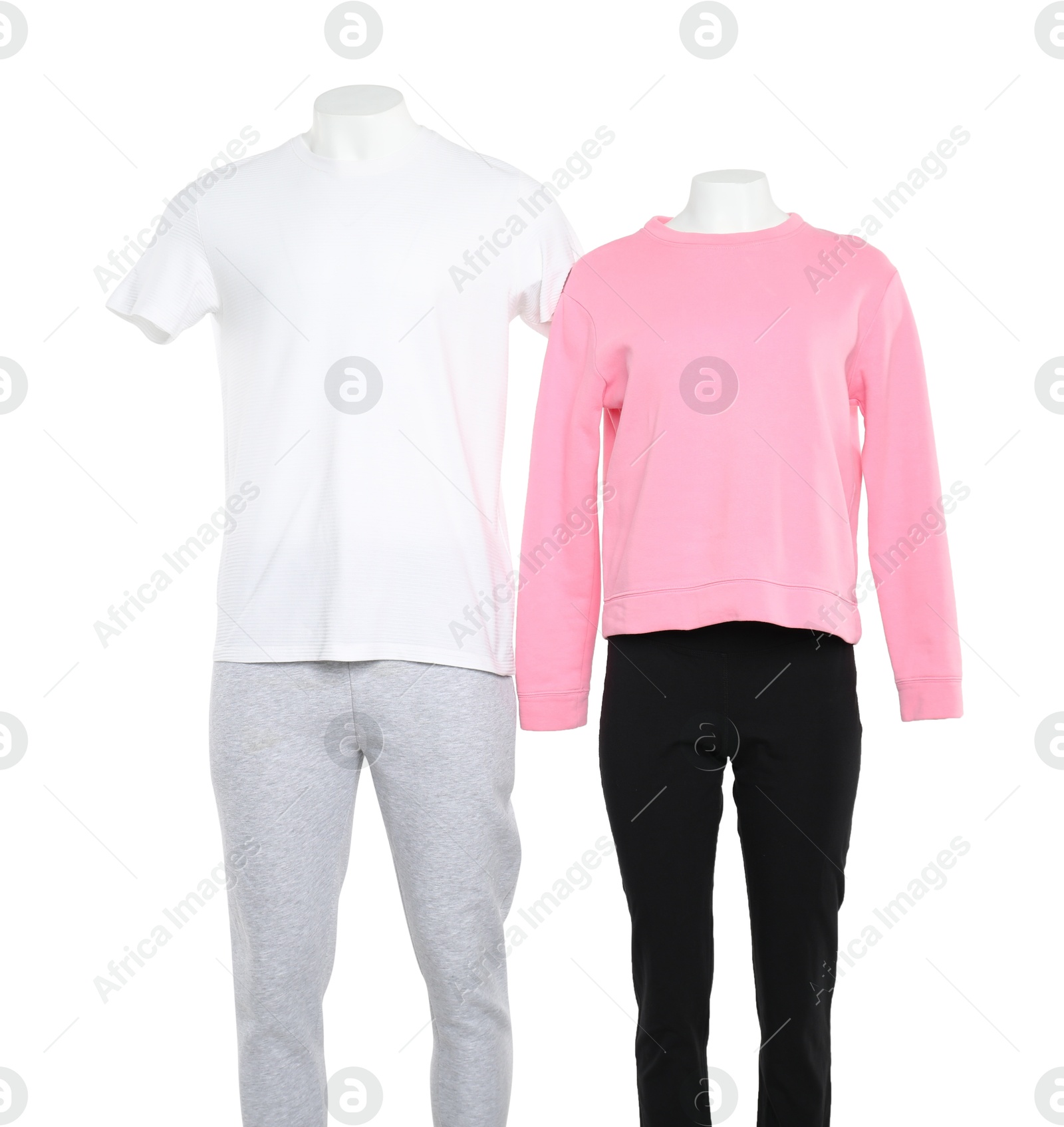 Photo of Female and male mannequins with stylish outfits isolated on white