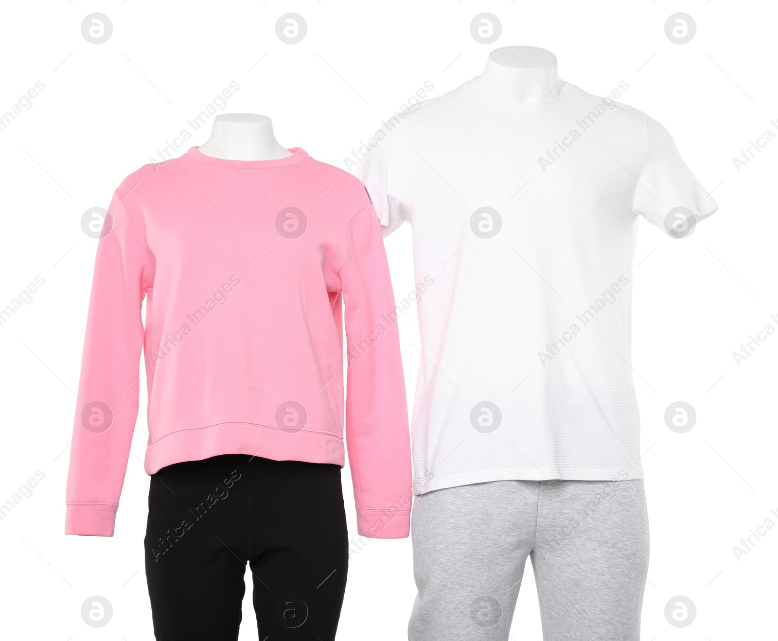 Photo of Female and male mannequins with stylish outfits isolated on white