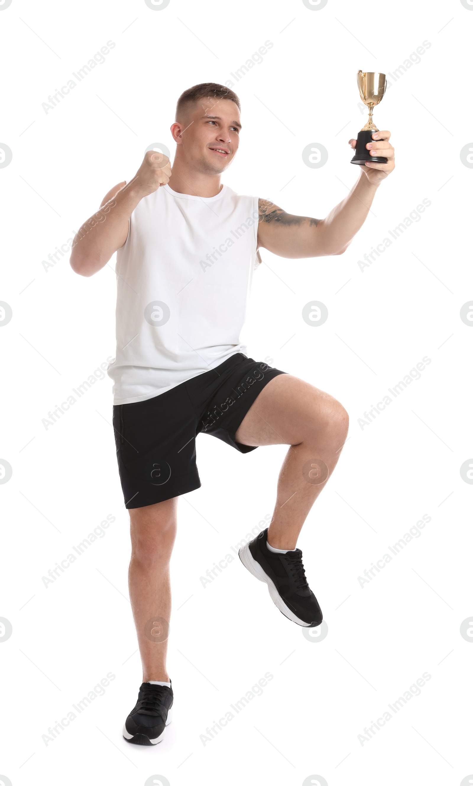 Photo of Happy winner with golden trophy cup on white background