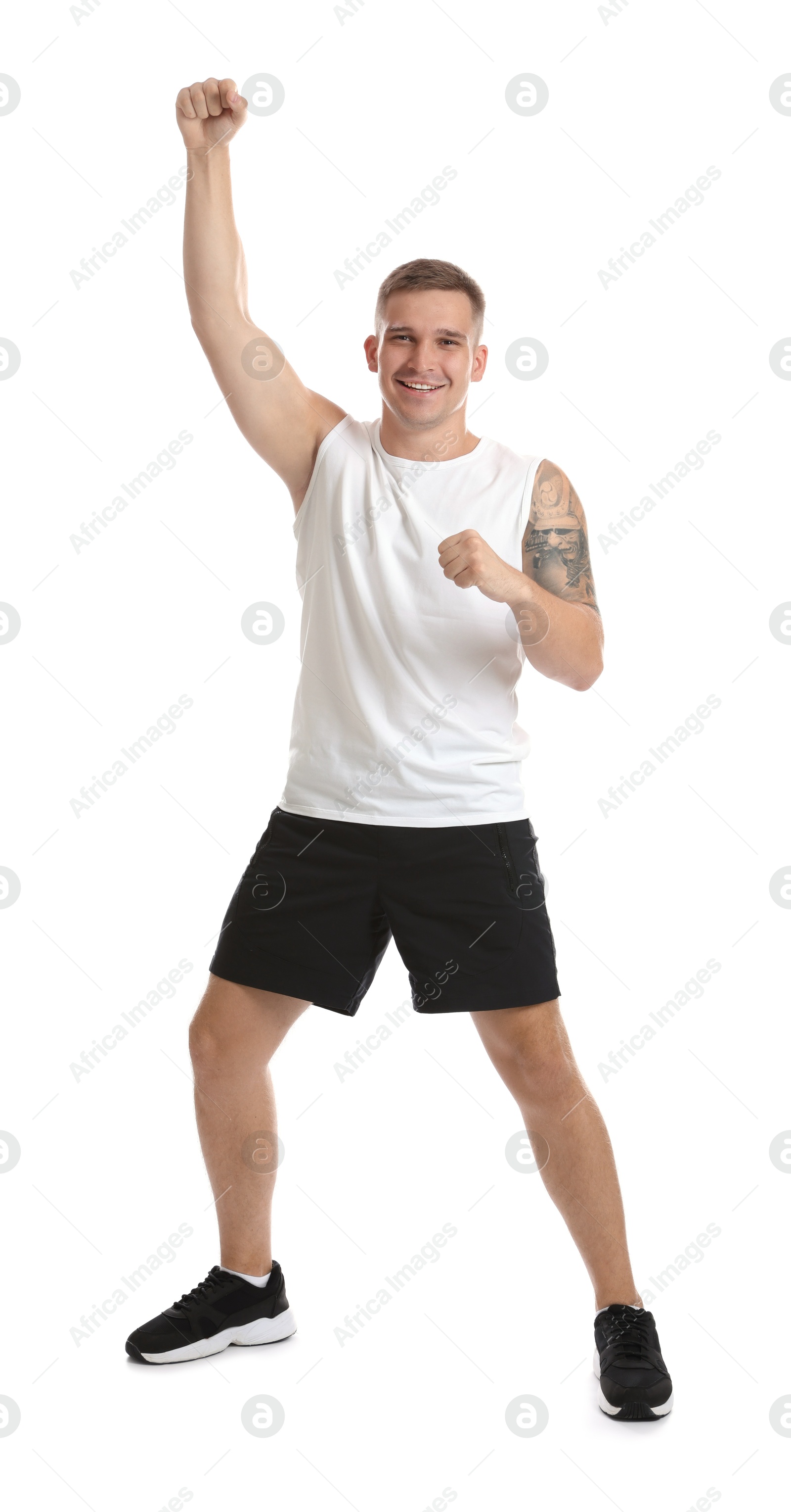 Photo of Portrait of happy winner on white background